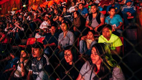 Fans watch the Lucha Libre match at Arena Mexico on Sunday, February 12. 
