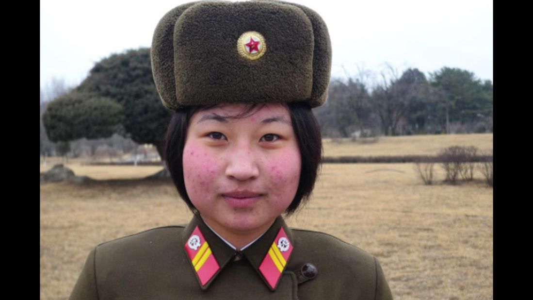 A soldier stands guard in North Korea on February 16. While military service for women has long been voluntary, it reportedly was made mandatory recently in a bid to bolster the armed forces.