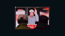 People watch a television showing news reports of Kim Jong-Nam, the half-brother of North Korean leader Kim Jong-Un, at a railway station in Seoul on February 14, 2017.