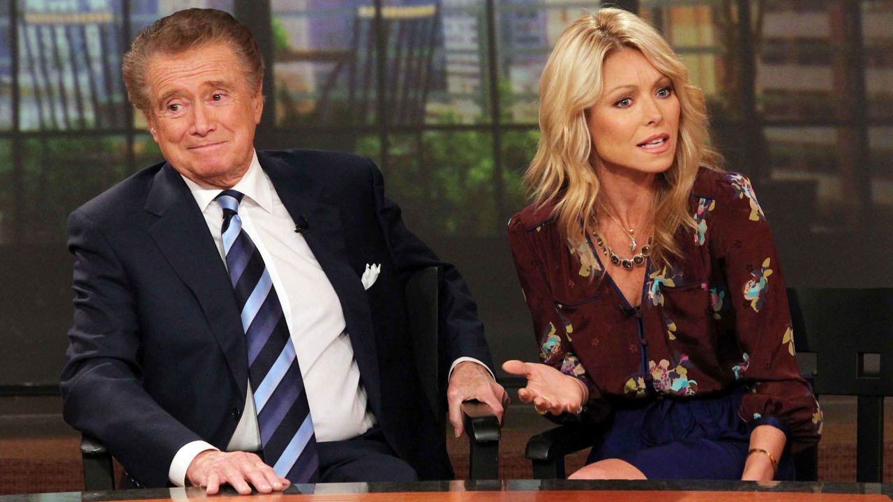 Regis Philbin and Kelly Ripa attend a press conference on Regis's departure from their TV talk show at ABC Studios on November 17, 2011, in New York City.