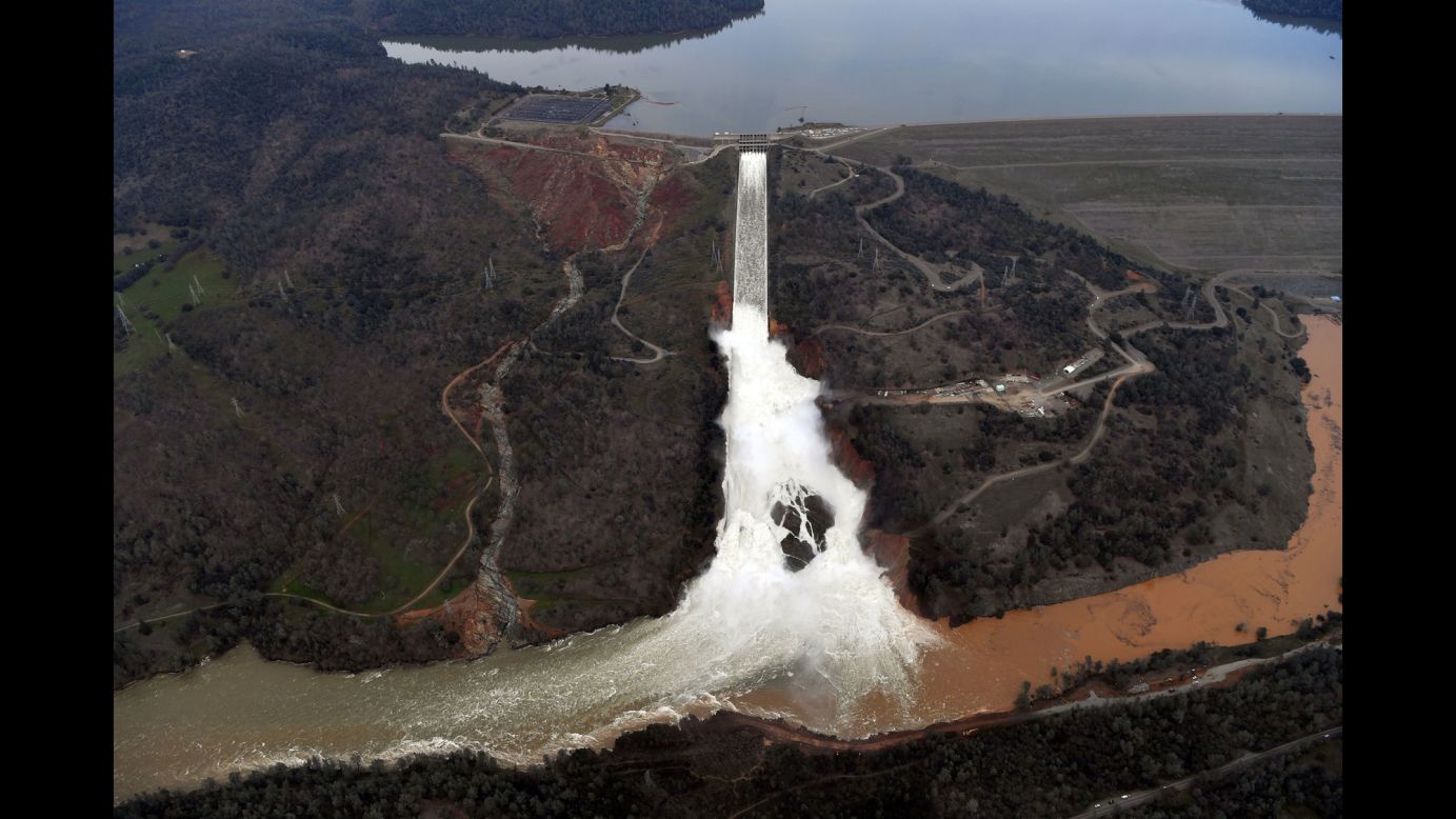 Water gushes over the main spillway at the Oroville Dam in Oroville, California, on Monday, February 13. Earlier this week, authorities ordered mandatory evacuations over concerns that an emergency spillway at the dam could fail and threaten nearby communities. Officials eventually <a href="http://www.cnn.com/2017/02/16/us/california-oroville-dam-storm-spillway/" target="_blank">downgraded the evacuation order</a> to a warning, allowing 188,000 evacuees to return home.