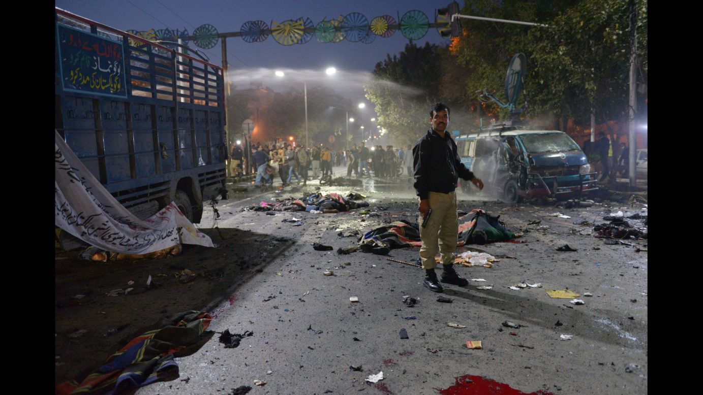 A police officer stands at the site of <a href="http://www.cnn.com/2017/02/13/world/lahore-blast-dead/" target="_blank">a deadly explosion</a> in Lahore, Pakistan, on Monday, February 13. Jamat-ul-Ahrar, a splinter group of Pakistan's Tehreek-i Taliban -- also known as the Pakistani Taliban -- claimed responsibility for the attack. At least 14 people were killed and 59 injured, according to government spokesman Malik Ahmad Khan.