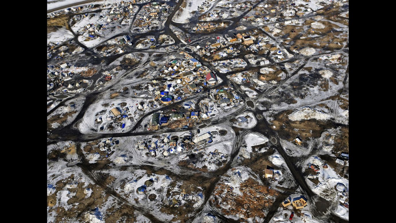 This aerial photo, taken on Monday, February 13, shows the Oceti Sakowin camp where people have gathered <a href="http://www.cnn.com/2016/09/09/us/gallery/north-dakota-oil-pipeline/index.html" target="_blank">to protest the Dakota Access Pipeline</a> in Cannon Ball, North Dakota. The pipeline is a $3.7 billion project that would cross four states and change the landscape of the US crude oil supply. The Standing Rock Sioux tribe says the pipeline would affect its drinking-water supply and destroy its sacred sites.