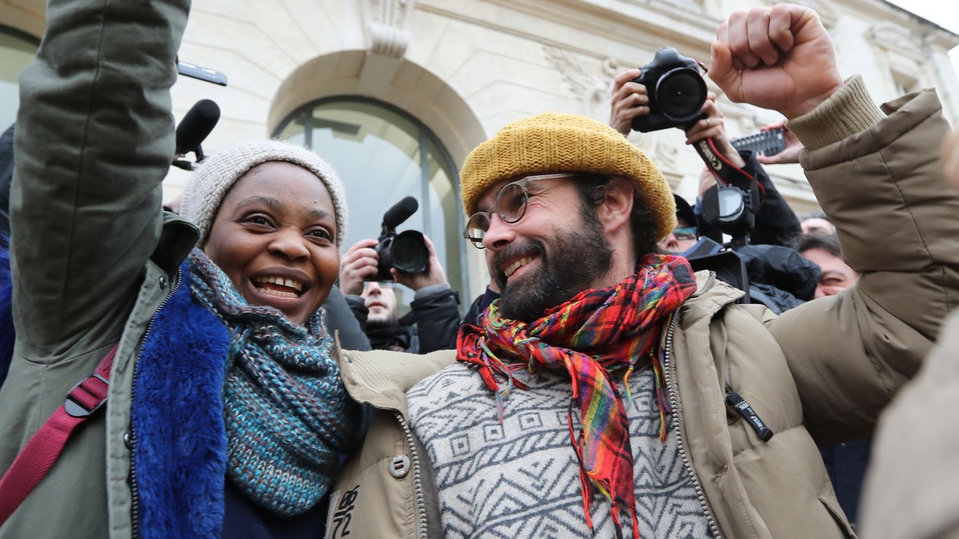 French farmer Cedric Herrou gestures next to a Malian woman named Khadidja as he leaves a courthouse in Nice, France, on Friday, February 10. A French court <a href="http://www.cnn.com/2017/02/10/europe/french-farmer-migrant-trial/" target="_blank">gave Herrou a suspended fine of 3,000 euros ($3,200)</a> for helping migrants enter France illegally, the prosecutor told CNN. Herrou has taken in dozens of migrants over the past year.