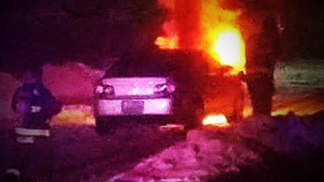 Video shows Novak's burning car.