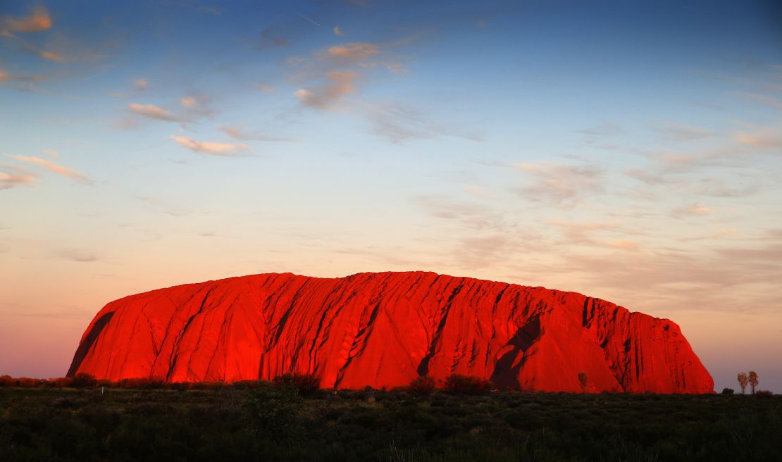 People who climb Uluru say it is an unforgettable experience -- but at what cost?