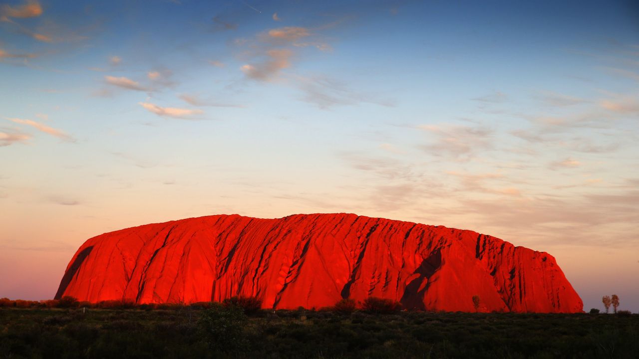 People who climb Uluru say it is an unforgettable experience -- but at what cost?