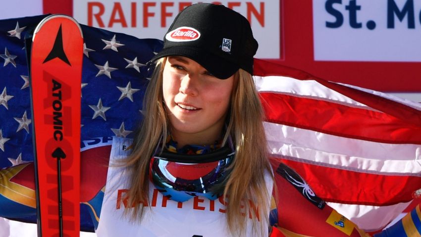US skier Mikaela Shiffrin waves a US flag as she celebrates her second place after  the women's giant slalom race at the 2017 FIS Alpine World Ski Championships in St Moritz on February 16, 2017.