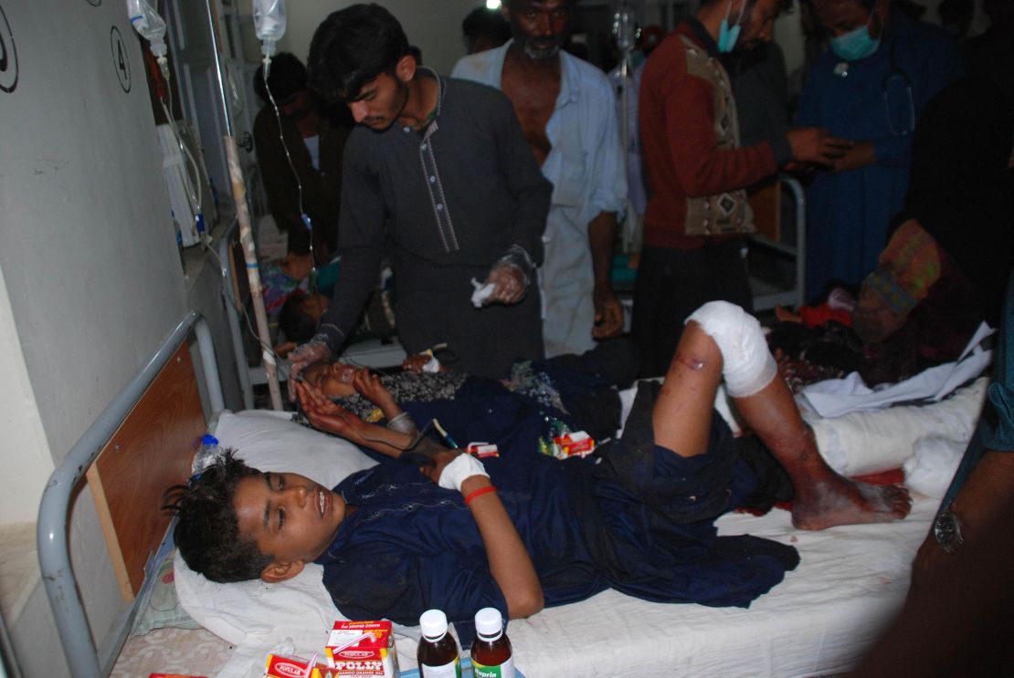 The wounded receive medical treatment Thursday at a Sehwan hospital.