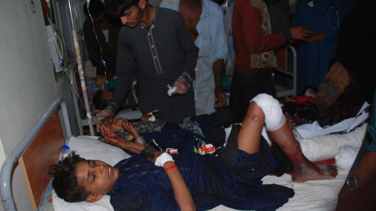 The wounded receive medical treatment Thursday at a Sehwan hospital.