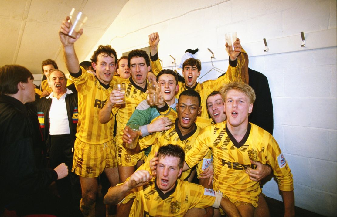 Sutton United's players celebrate after beating Coventry City in the 1989 FA Cup third round.