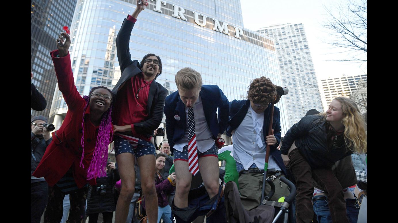 Protesters pull down their pants to moon Trump Tower in Chicago on Sunday, February 12.