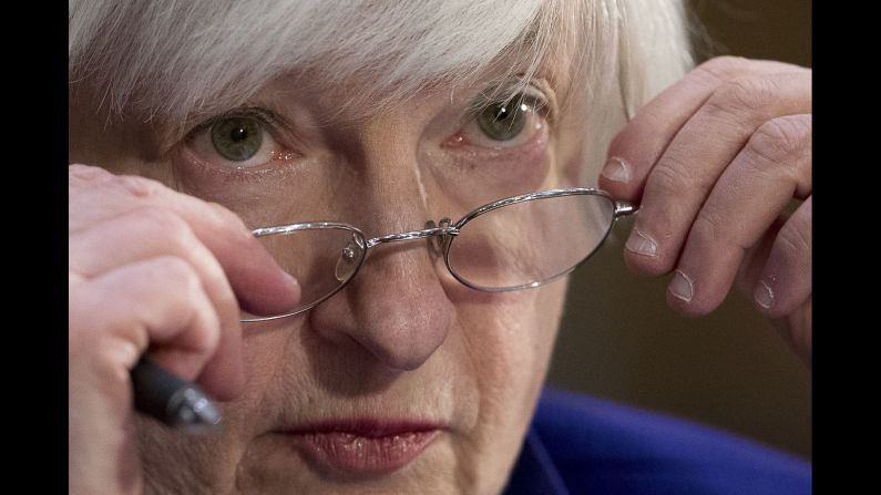 Federal Reserve chair Janet Yellen adjusts her glasses while testifying before the Senate Banking Committee on Tuesday, February 14. Yellen signaled that <a href="index.php?page=&url=http%3A%2F%2Fmoney.cnn.com%2F2017%2F02%2F14%2Fnews%2Feconomy%2Fjanet-yellen-federal-reserve-hike-testimony%2F" target="_blank">the next interest-rate increase</a> could come as early as March.