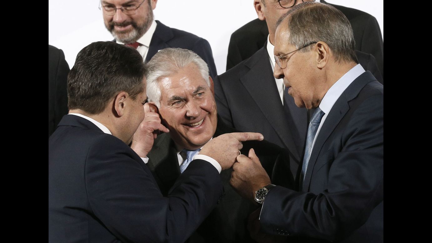 From left in front, German Foreign Minister Sigmar Gabriel, US Secretary of State Rex Tillerson and Russian Foreign Minister Sergey Lavrov prepare for a group photo at the G20 summit in Bonn, Germany, on Thursday, February 16.