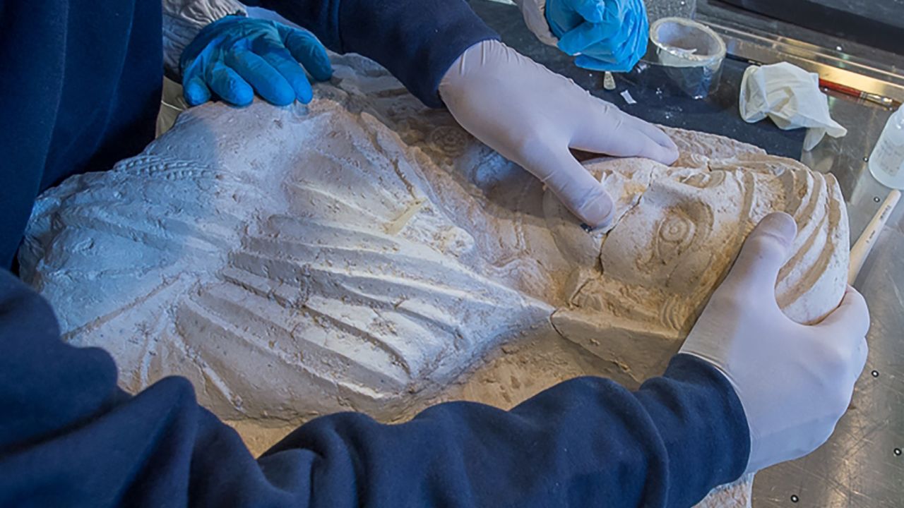 The ancient carvings were repaired using nylon powder and a 3-D printer.
