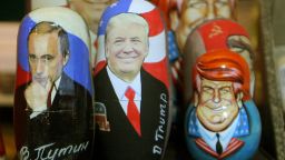 Traditional Russian wooden matryoshka doll with a picture of President-elect Donald Trump (center) and Russian President Vladimir Putin (left) at the fair on the Red Square in Moscow. Russia, Friday, January 6, 2017 Hacker attacks have not affected the results of the US presidential election. This was stated by the president-elect of the United States by Donald Trump on Friday, January 6, 2017 (Photo by Danil Shamkin/NurPhoto via Getty Images)
