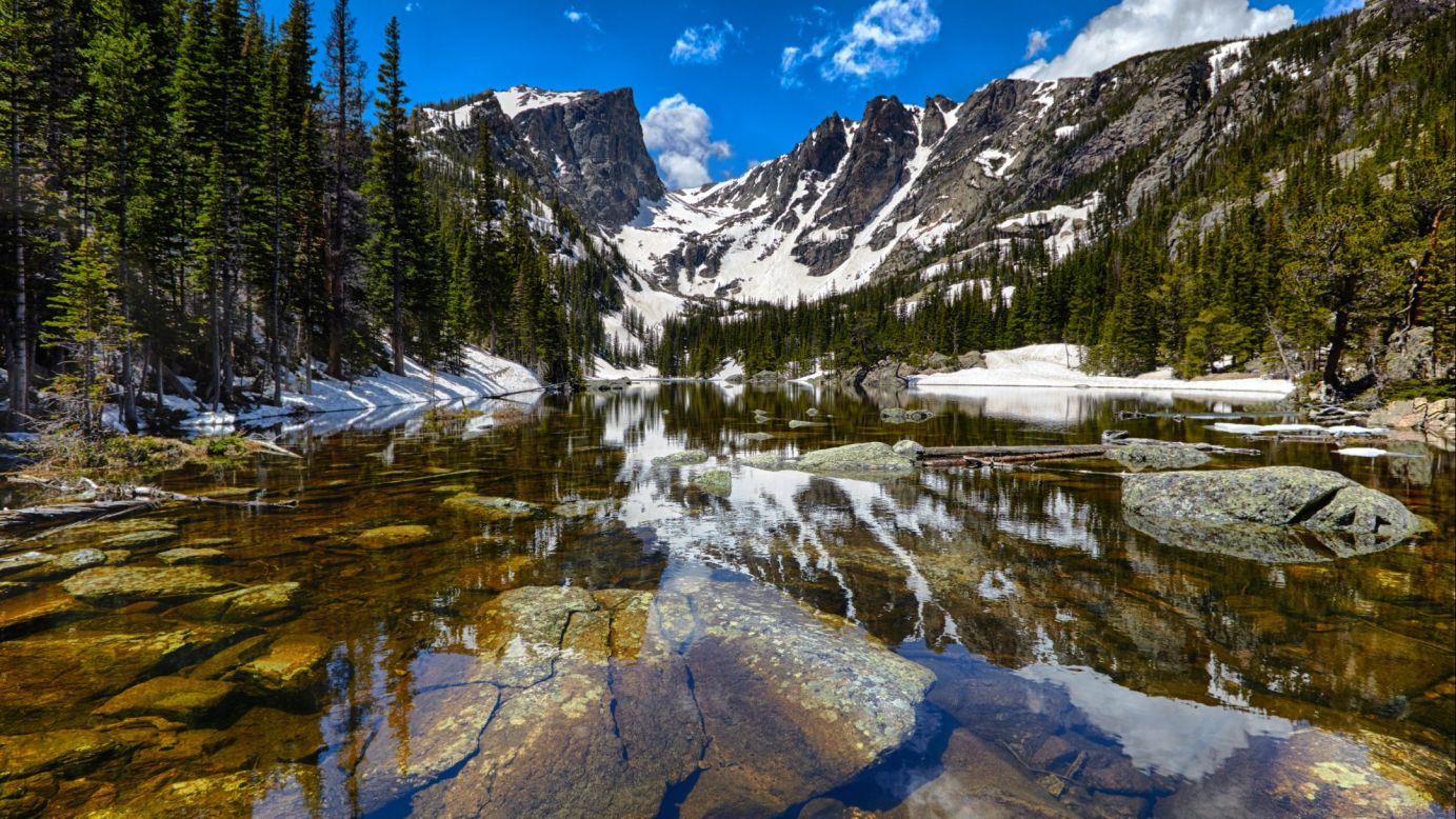 <strong>4. Rocky Mountain National Park, Colorado:</strong> This 415-square-mile park's elevation ranges from 7,600 feet to 14,259 feet, and the park is home to 77 peaks above 12,000 feet. The park, which hosts a diversity of animal and plant life, also straddles the Continental Divide. Dream Lake is shown here. 