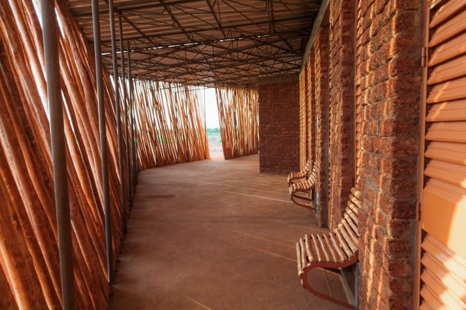 Furniture inside the classrooms are made from local hardwoods and leftover materials from construction such as steel cutaways from the roof.