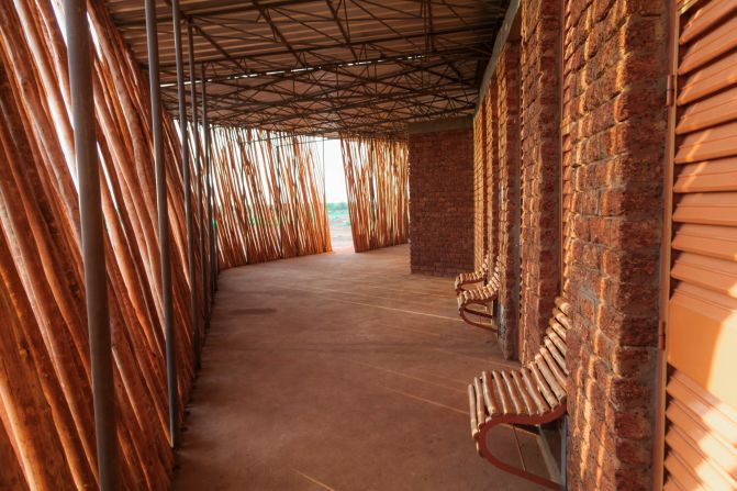 Furniture inside the classrooms are made from local hardwoods and leftover materials from construction such as steel cutaways from the roof. 