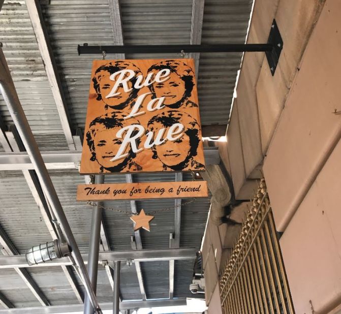 The sign outside Rue La Rue Café in New York City carries a line from "The Golden Girls" theme song, "Thank You for Being a Friend." 