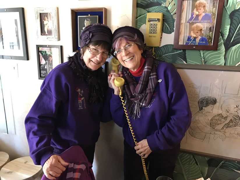 Diane Pape (right) from Saginaw, Michigan, says she's "the Rose character" from "The Golden Girls," while her friend is "the Blanche," during a recent visit to the Rue de la Rue Café.