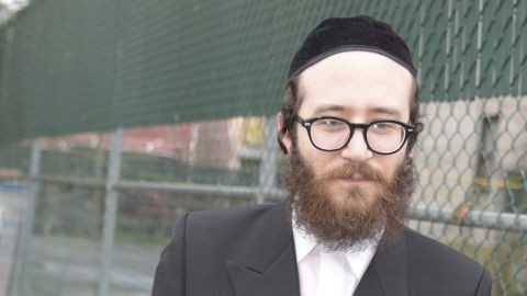 BROOKLYN, NEW YORK CITY, NEW YORK, UNITED STATES - 2016/04/07: Chasidic Jew Jake Turx with copy of Ted Cruz's book. Republican presidential candidate senator Ted Cruz, TX, visiting the Brighton Beach area of Brooklyn, stopping at a Chabad Lubavitch sponsored preschool before moving on to speak & answer questions at a Chassidic community center. (Photo by Andy Katz/Pacific Press/LightRocket via Getty Images)