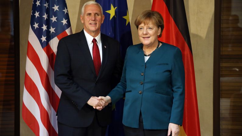 US Vice President Mike Pence and German Chancellor Angela Merkel shake hands at the 2017 <a href="index.php?page=&url=http%3A%2F%2Fwww.cnn.com%2F2017%2F02%2F18%2Fpolitics%2Fpence-munich-russia-foreign-policy%2F" target="_blank">Munich Security Conference</a> on February 18, in Germany. 