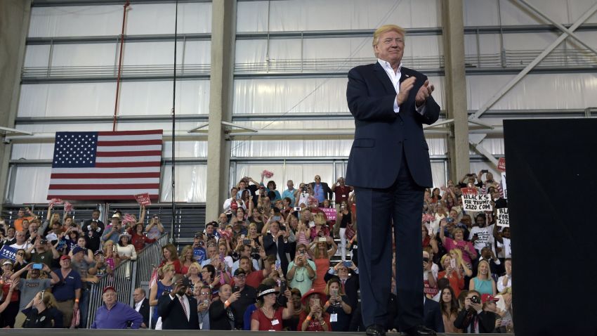 President Donald Trump waits to speak at his "Make America Great Again Rally" at Orlando-Melbourne International Airport in Melbourne, Fla., Saturday, Feb. 18, 2017. Trump is launching his 2020 re-election campaign just 1,354 days before the 2020 election. (AP Photo/Susan Walsh)
