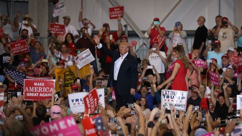 President Donald Trump and first lady Melania Trump stand together during a campaign rally on February 18, 2017 in Melbourne, Florida. 