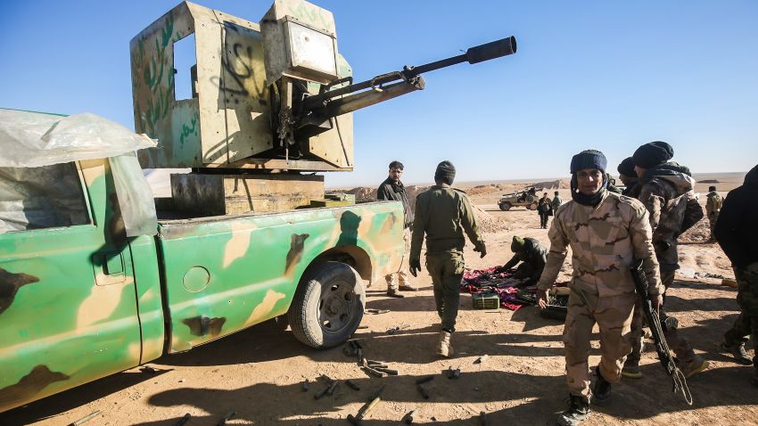 Fighters of the Hashed al-Shaabi (Popular Mobilisation) paramilitaries prepare defensive positions near the frontline village of Ayn al-Hisan, on the outskirts of Tal Afar west of Mosul, where Iraqi forces are preparing for the offensive retake the western side of Mosul from Islamic State (IS) group fighters, on February 18, 2017. / AFP / AHMAD AL-RUBAYE        (Photo credit should read AHMAD AL-RUBAYE/AFP/Getty Images)