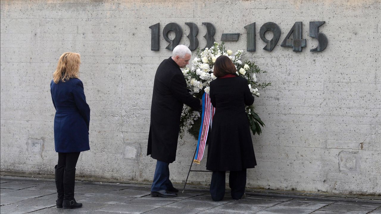 Pence is joined by his wife, Karen, and his daughter Charlotte as he lays a wreath at the Dachau Concentration Camp Memorial Site in southwestern Germany in February 2017.