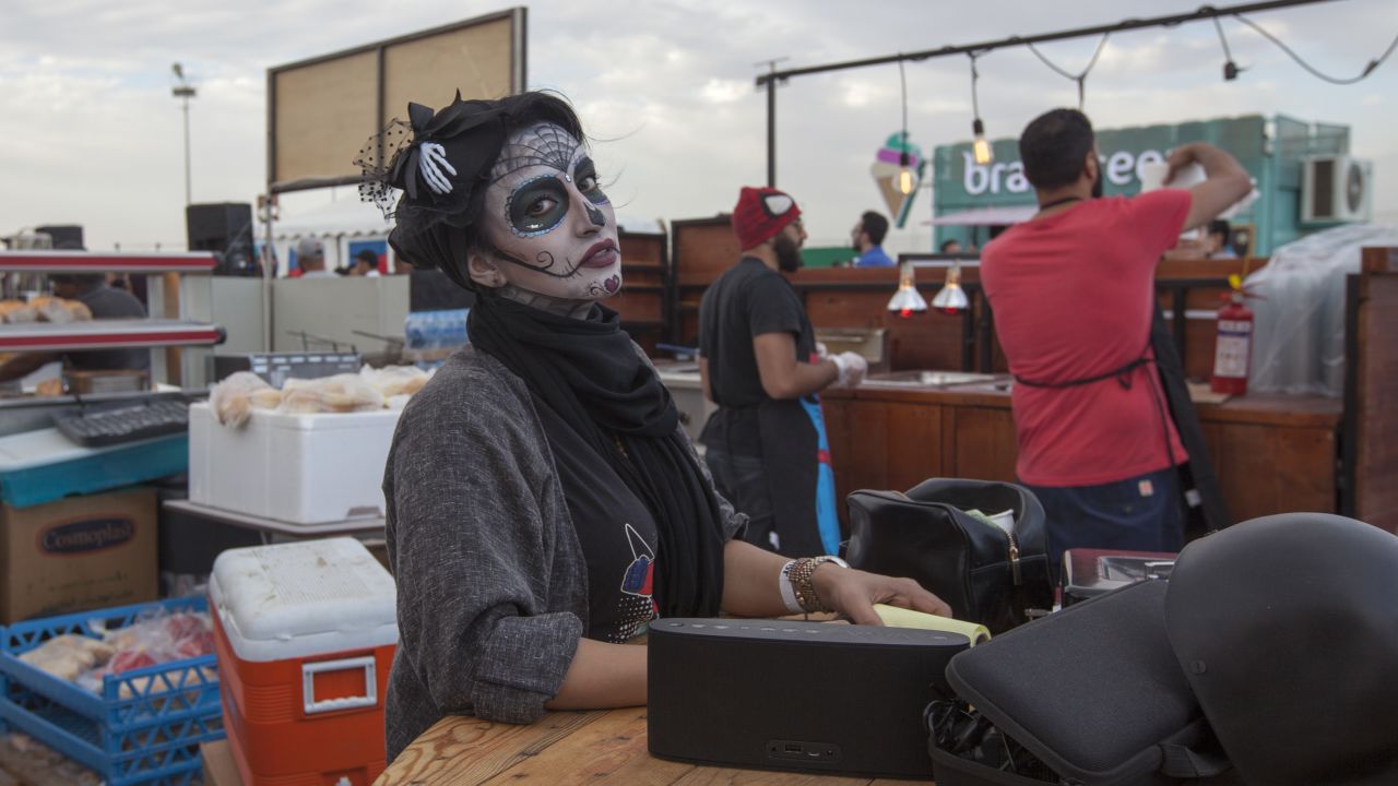 A woman has her face made up at the event.