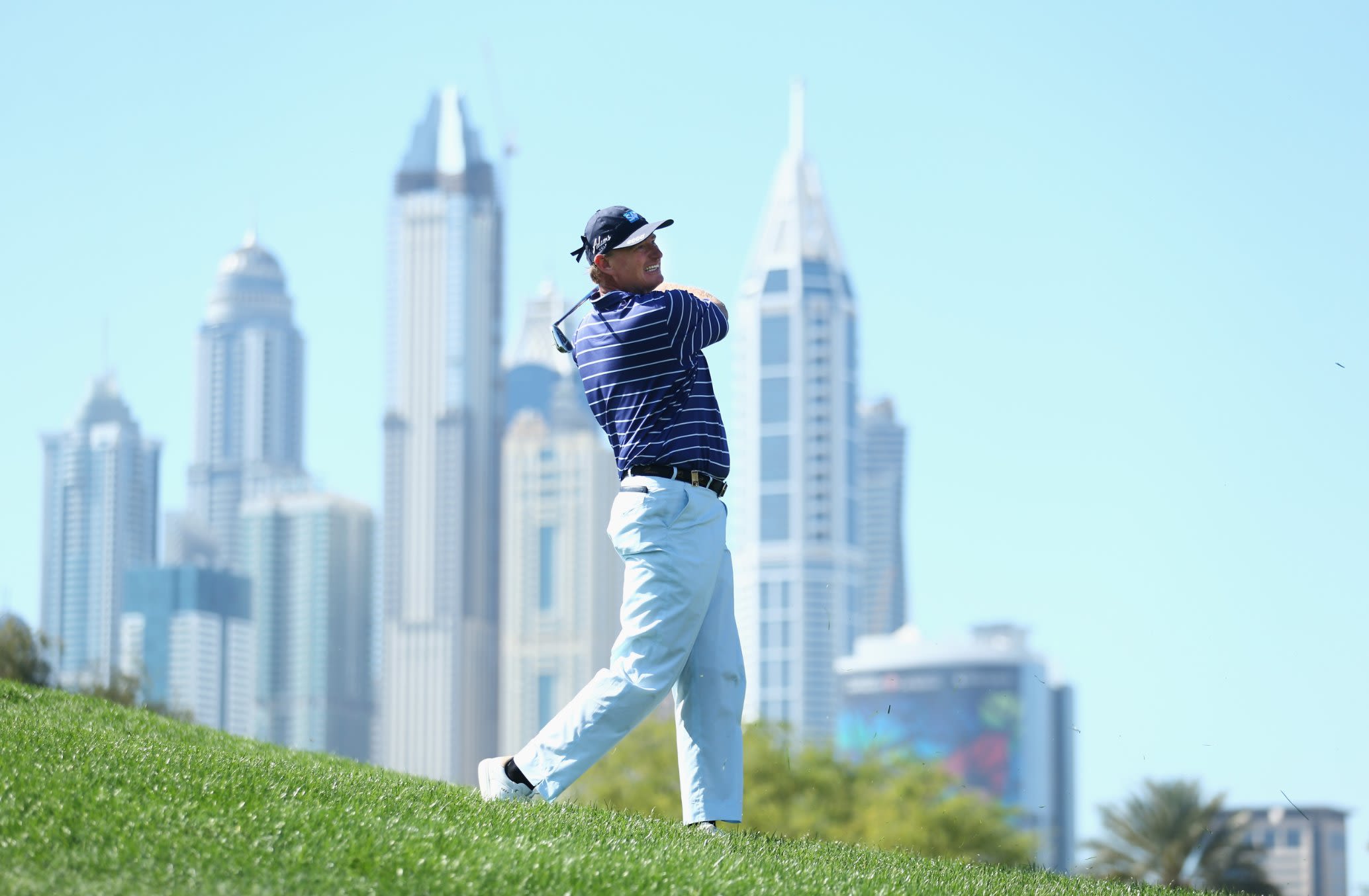 Four major wins (US Open 1994, 1997; British Open 2002, 2012).