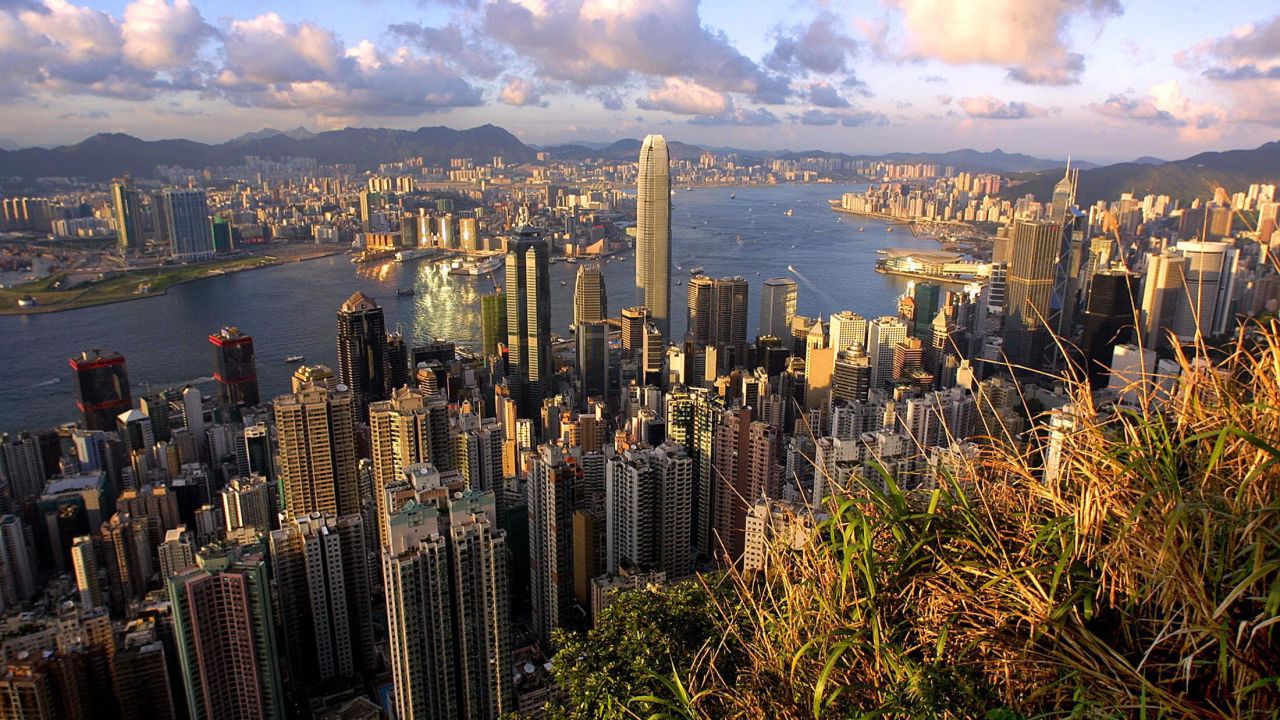 This general view from "The Peak" shows Hong Kong's latest addition to its skyline, the newly completed 88-storey Two IFC building (C), towering above the city, 12 July 2003. Two IFC, which is the third tallest building in the world behind the Sears Tower in Chicago and the Petronas Towers in Kuala Lumpur, is expected to open for business in a month.     AFP PHOTO/Richard A. BROOKS   (Photo credit should read RICHARD A. BROOKS/AFP/Getty Images)