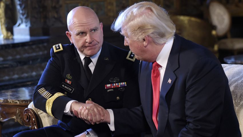 President Donald Trump, shakes hands with Army Lt. Gen. H.R. McMaster, at Trump's Mar-a-Lago estate in Palm Beach, Florida on February 20, 2017, where he announced that McMaster will be the new national security adviser.