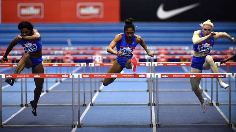 From left, Sharika Nelvis, Christina Manning and Sally Pearson compete in the 60-meter hurdles at an indoor meet in Birmingham, England, on Saturday, February 18. Manning won the event in 7.83 seconds, edging fellow American Nelvis. Pearson, an Australian, finished in third.