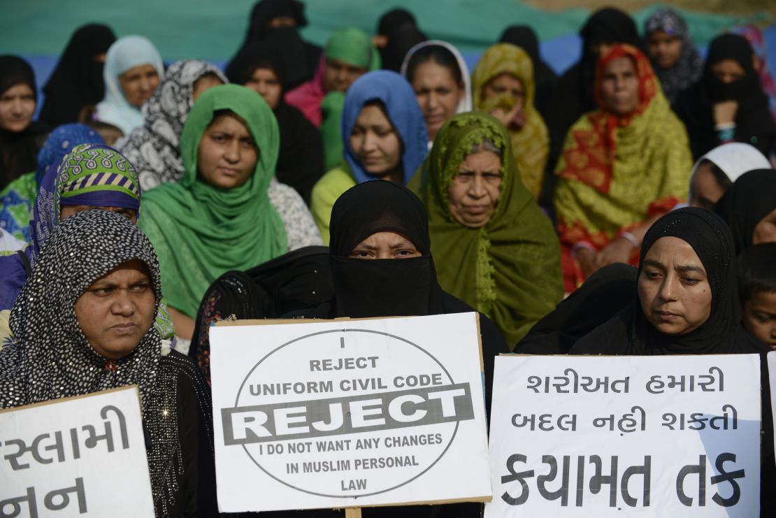 Indian Muslim women participate in a rally to oppose the Uniform Civil Code (UCC) that would outlaw the practice of "triple talaq" in Ahmedabad on November 4, 2016.
I