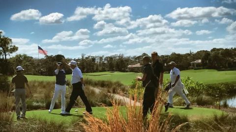 President Donald Trump plays golf with Japanese Prime Minister Shinzo Abe.