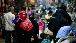 In this photograph taken on April 28, 2016, Muslim shoppers walk through a market in Bhopal.
Only three words were scrawled on the letter from her husband and posted to her parent's home in central India, but they were enough to shatter Sadaf Mehmood's life. Using an ancient and controversial Islamic practice, Mehmood's husband wrote "talaq, talaq, talaq" or "I divorce you" three times in Arabic, instantly ending his marriage of five years.
 / AFP / MONEY SHARMA / TO GO WITH INDIA-MARRIAGE-RELIGION-WOMEN-RIGHTS, FEATURE BY JALEES ANDRABI        (Photo credit should read MONEY SHARMA/AFP/Getty Images)