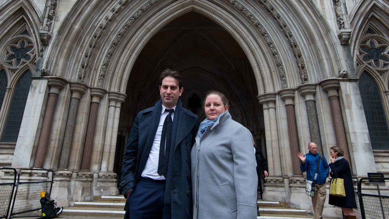 Charles Keidan and Rebecca Steinfeld outside the High Court in London.