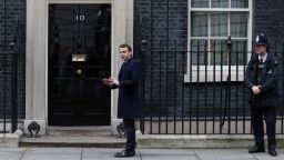 French presidential election candidate arrives outside 10 Downing Street  on February 21, 2017, ahead of his meeting with British Prime Minister Theresa May.