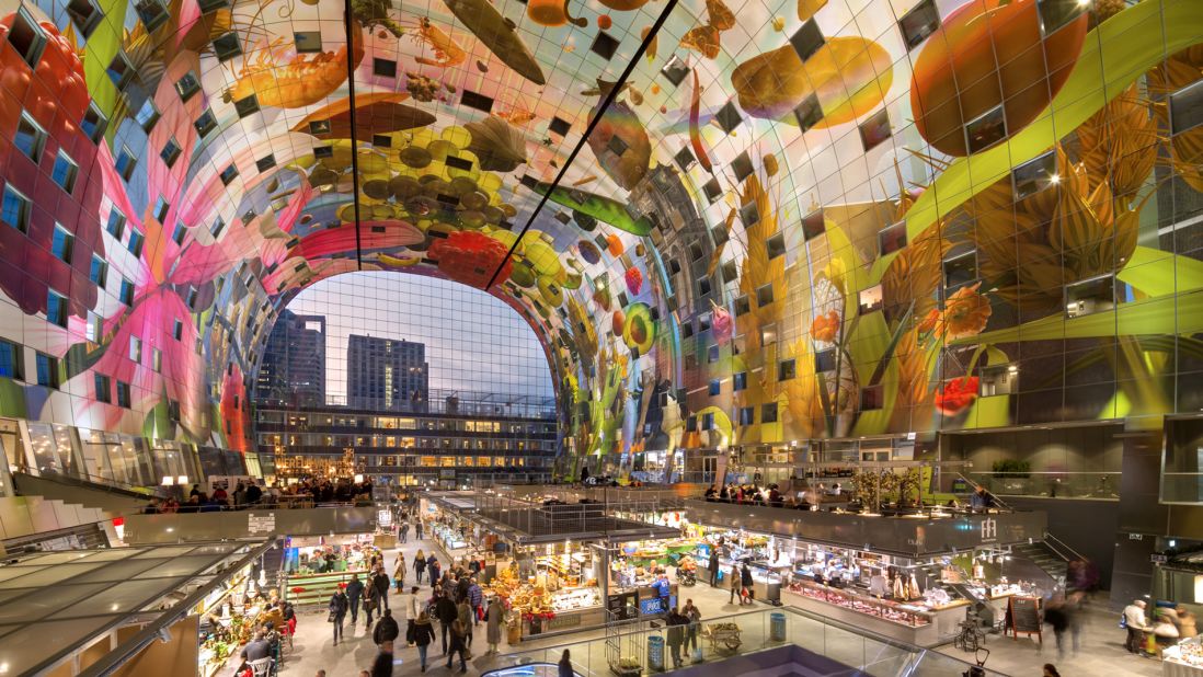 <strong>The world's biggest artwork: </strong>Spanning over 13,000 square yards on the ceiling of the Markthal, the Horn of Plenty by Arno Coenen is the world's largest artwork. It's a painting depicting fruit tumbling from a summer sky, grazing cows and flowers.