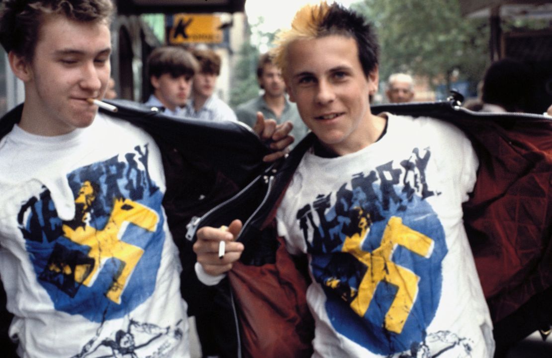 Two boys wearing Vivienne Westwood Destroy T-shirts. 