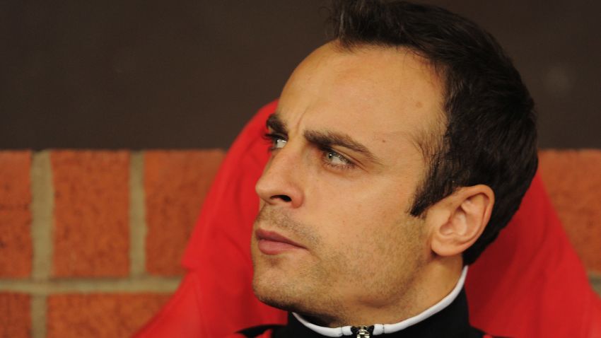 MANCHESTER, ENGLAND - SEPTEMBER 27:  Dimitar Berbatov of Manchester United looks thoughtful as he sits on the bench prior to the UEFA Champions League Group C match between Manchester United and FC Basel at Old Trafford on September 27, 2011 in Manchester, England.  (Photo by Michael Regan/Getty Images)