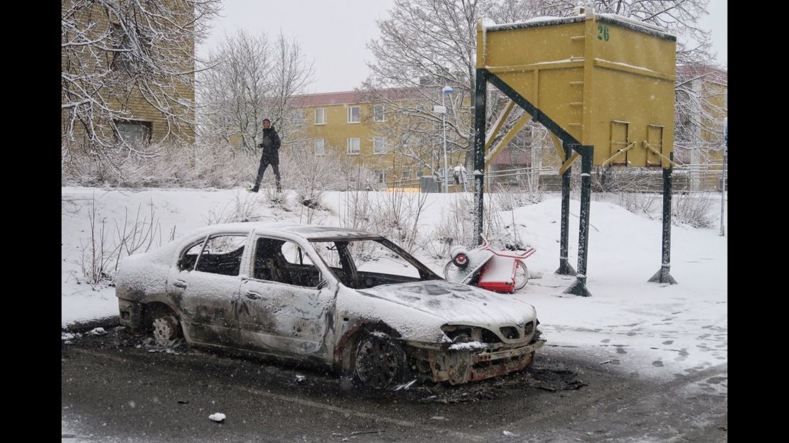 Police say 10 cars were set alight during riots in the Stockholm suburb of Rinkeby.