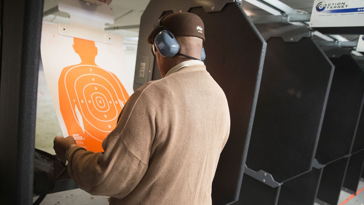 A man practices his marksmanship skills at the Metro Shooting Supplies range in 2014 in a suburban St. Louis store near Ferguson, Missouri.