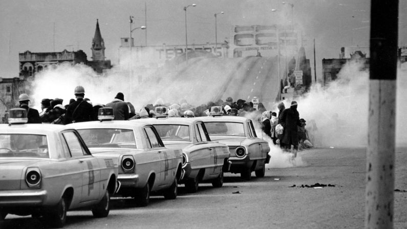 About 600 people began a 50-mile march from Selma to the state Capitol in Montgomery on March 7, 1965. But as they descended to the foot of the Edmund Pettus Bridge in Selma, state troopers used brutal force and tear gas to push them back. The incident is now known as <a href="index.php?page=&url=http%3A%2F%2Fwww.cnn.com%2F2015%2F01%2F06%2Fus%2Fgallery%2Fselma-bloody-sunday-1965%2Findex.html" target="_blank">"Bloody Sunday."</a>