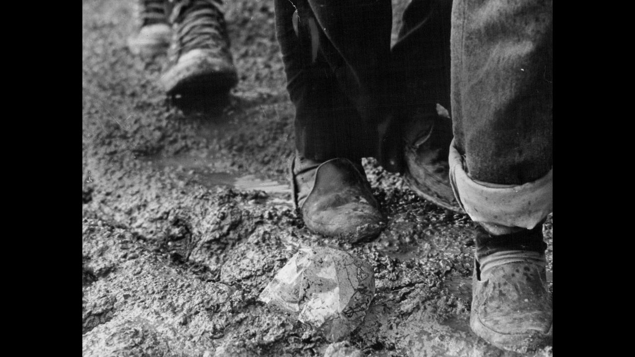 Marchers walk through mud. The protest had grown to about 25,000 people by the time it reached Montgomery.
