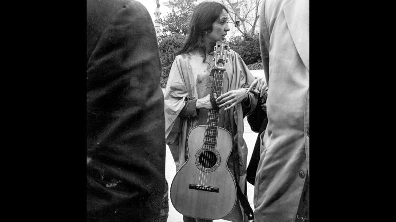 Singer Joan Baez, who entertained activists with music before the march, stands in Montgomery on March 25.