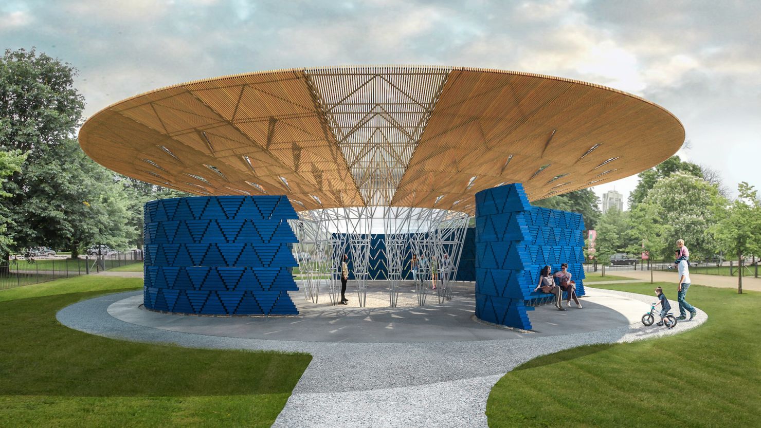 Francis Kéré creates appeal where others find simplicity, preferring economical buildings to lavish Skyscrapers. 
Entirely constructed from wood, his latest structure is the 17th edition of the Serpentine Pavilion to be built in June.